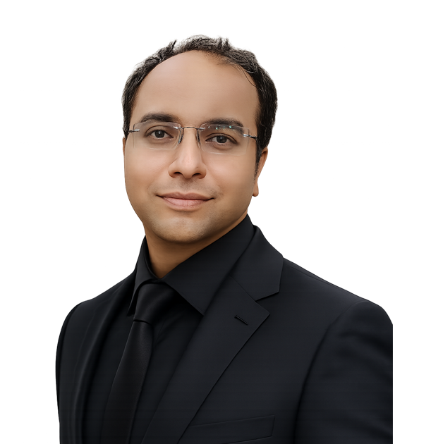 Vasim Mansuri, wearing a black suit and black shirt